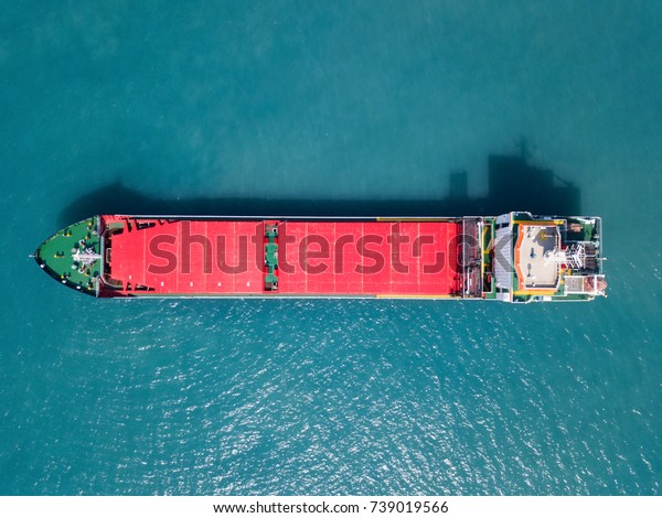 Large Bulk carrier vessel at the Mediterranean sea\
- Top down aerial image