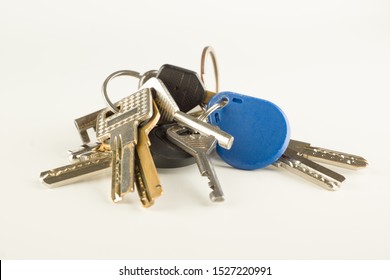 large bunch of different keys isolated on a white background