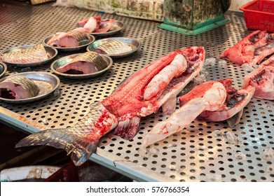 Large butchered fish on sale at a Hong Kong wet market.