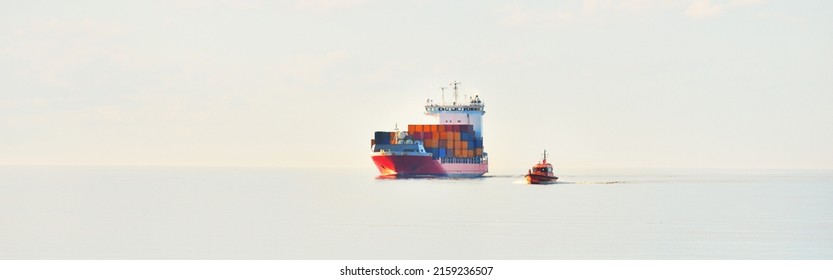 Large Cargo Container Ship Being Led By The Pilot Boat. Piloting Service. Unknown Waters. Global Communications, Logistics, Industry, Freight Transportation, Nautical Vessel, Nautical Route, Port