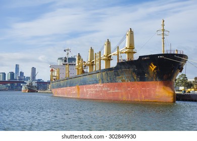 A Large Cargo Vessel In The Port Of Melbourne, Australia During Daytime