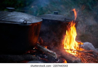 Large Cauldrons On An Open Hearth. Outdoor Cooking Concept. Can Be Used As A Background.