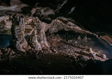 large central chamber of the cave with columns of stalactites and stalagmites
