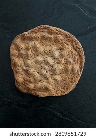 A large chocolate chip cookie 