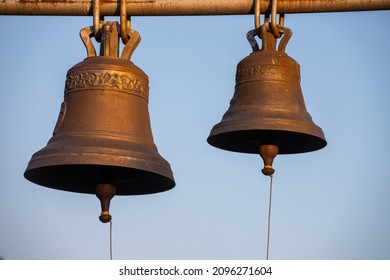 Large Church bell hanging outside. Close-up view of metal orthodox church bell. - Shutterstock ID 2096271604