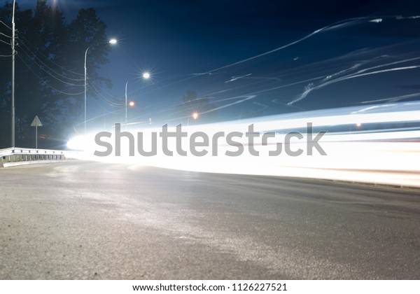 Large city\
road night scene, night car light\
trails