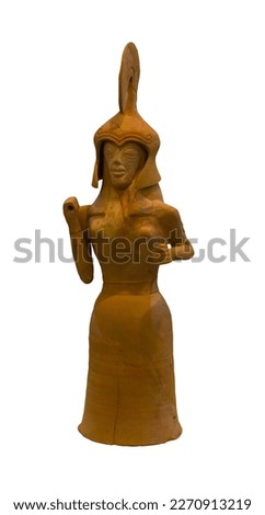 Large clay female figurine with helmet, dedicated to the sanctuary of Gortyna isolated on white. She held shield and spear, in the type of Athena Promachos, the goddess of wisdom and war
