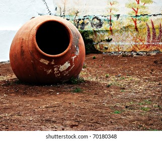 Large clay jar in the open