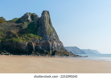 A large cliff on the beach - Shutterstock ID 2251090245