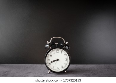 A large clock mounted to the side