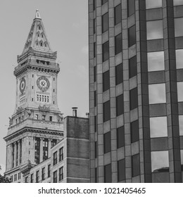 a large clock tower towering over a city