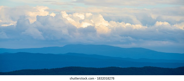 Large clouds over mountain range