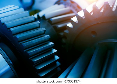Large cog wheels in the motor Gear box - Shutterstock ID 673031374