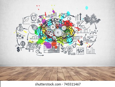 Large   colorful brain and gears it is drawn concrete wall and business plan sketch  Concept strategy   creativity in business 