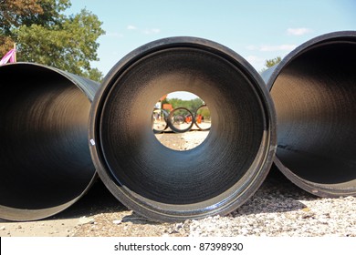 Large Concrete Construction Pipes for Underground Water - Powered by Shutterstock