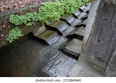 A Large Concrete Monsoon Drain With Some Water During The Dry Season