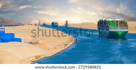 Large container ship, accompanied by tugboat, passing through the Suez Canal in Egypt.