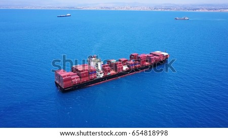 Large Container ship on the open sea isolated - aerial 