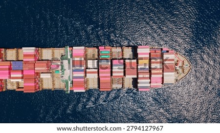 Large container ship transporting numerous colorful shipping containers across vast blue ocean waters, representing global logistics, import, and export