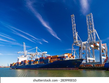 Large Container Vessel Unloaded In Port Of Rotterdam