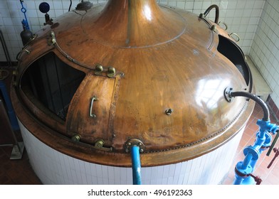 A Large Copper Topped Beer Still At The Qingdao Beer Factory In China. 