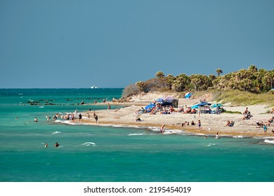 Large Crowd Of People On Sandy Ocean Beach Sunbathing And Enjoyng Vacation By The Sea. Venice, USA - June 14, 2022.