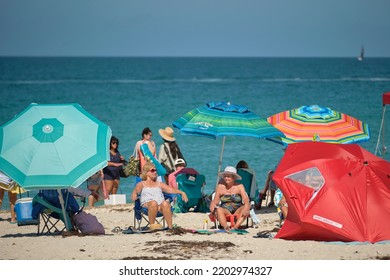 Large Crowd Of People On Sandy Ocean Beach Sunbathing And Enjoyng Vacation By The Sea. Venice, USA - June 14, 2022.