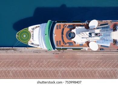 Large Cruise Ship Docked At Port - Top Down Aerial View