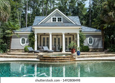 Large Custom Backyard Swimming Pool With Hot Tub And Pool House For Guests