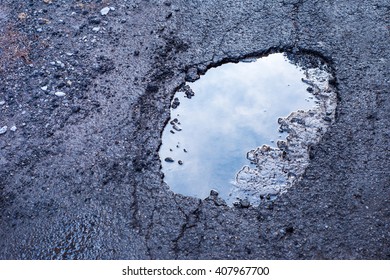 Large Deep Pothole In Montreal Street