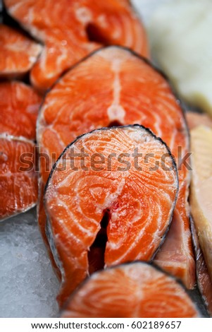 Large delicious chunks of red fish salmon photographed close up