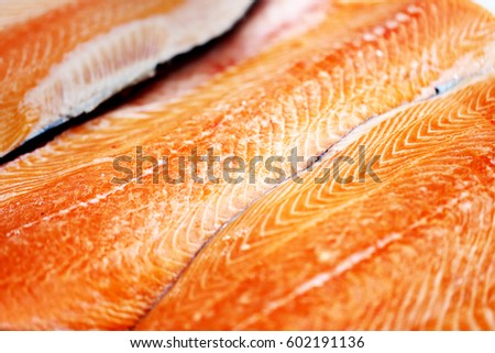 Large delicious chunks of red fish salmon photographed close up