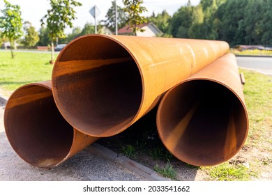 Large Diameter Pipes, Large Rusty Metal Pipes.