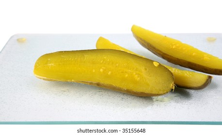 Large Dill Pickle Slices Isolated On White With Room For Your Text