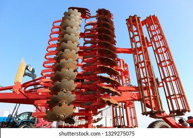 Large Disc Plough, Towing For Tractors To Plow Fields, Against The Sky