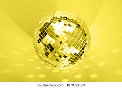 Large disco ball color year 2021 illuminating toning with highlights and reflection.Festive atmosphere.Copy space 