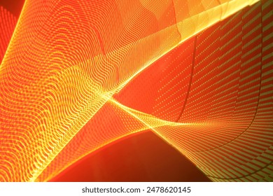 A large display featuring a pattern of orange lights radiating outward along distinct lines