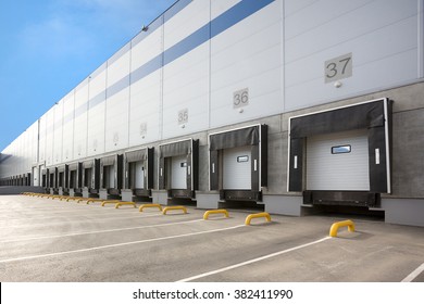A Large distribution warehouse with gates for loading goods