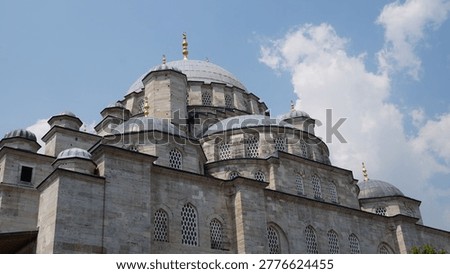 large domed mosque building under sky