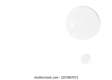 large drops of transparent gel or serum or water, on a white background, top view, isolated - Shutterstock ID 2257807071