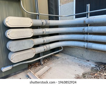 Large Electrical Conduit Pipes In System Outside Building Facility