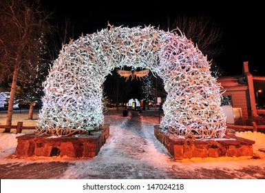 Large elk antler arches curve over Jackson Hole, Wyoming's square's four corner entrances. The antlers have been there since the early 1960s, and new arches are currently assembled to replace them.
