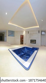 Large Empty Hot Tub Inside Luxury Bathroom Interior