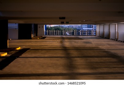 Large Empty Singapore Carpark At Dusk