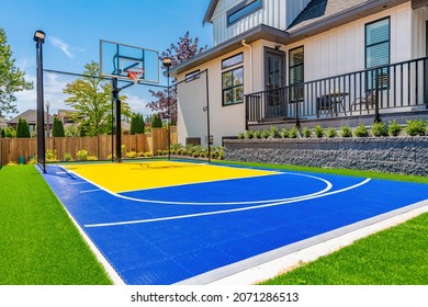 Large Estate Home With Sport Court Backyard Sunshine Blue Sky Landscaping And Deck