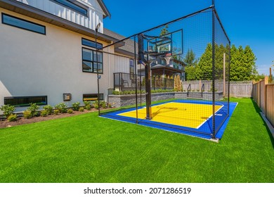 Large Estate Home With Sport Court Backyard Sunshine Blue Sky Landscaping And Deck