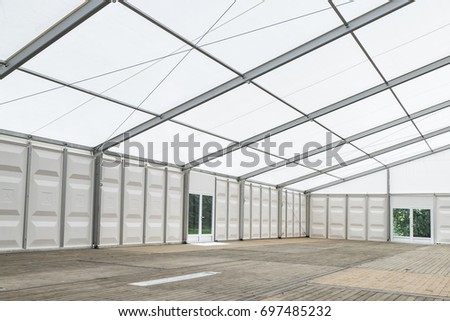Large Exhibition Tent with glass door in Summer - Outdoor shot.