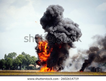 Large explosion with black smoke