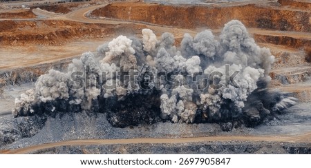 Large explosion dynamite at open pit mine during blasting operation, industry panorama.