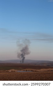 A large explosion in a field
